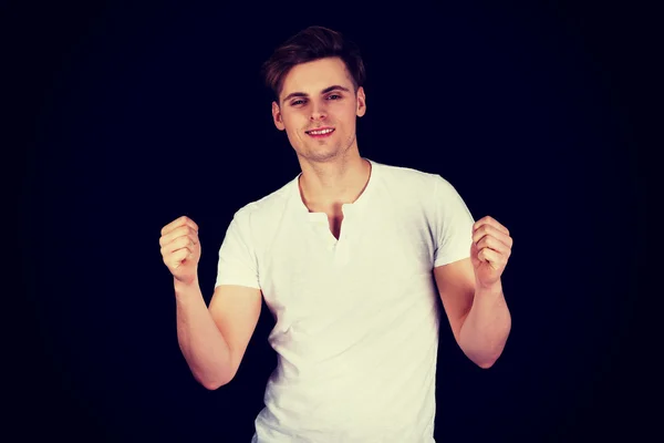 Young man showing winner gesture. — Stock Photo, Image