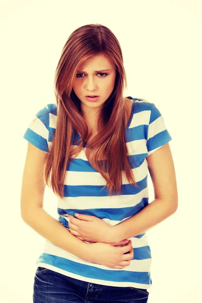 Mujer adolescente con dolor de estómago — Foto de Stock