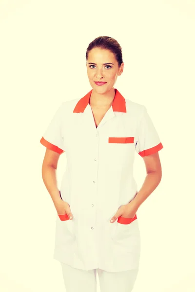 Junge lächelnde Ärztin oder Krankenschwester — Stockfoto