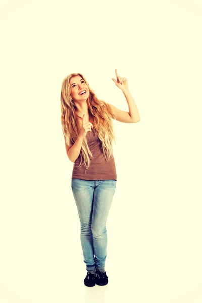 Student woman pointing up — Stock Photo, Image