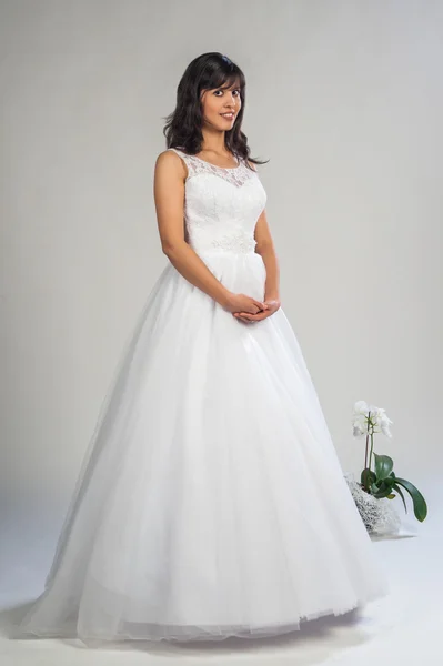 Young beautiful girl in a wedding dress — Stock Photo, Image