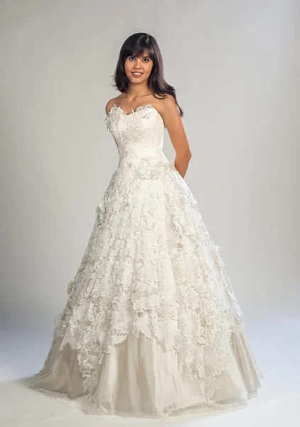 Young beautiful girl in a wedding dress — Stock Photo, Image