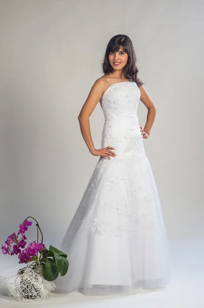 Young beautiful girl in a wedding dress — Stock Photo, Image