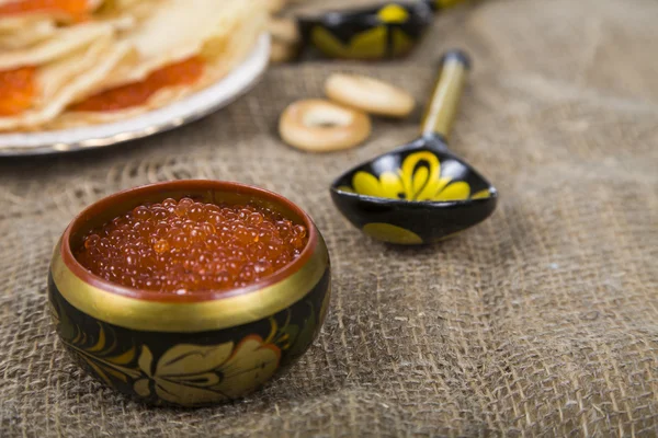 Pancakes with caviar on the table — Stock Photo, Image