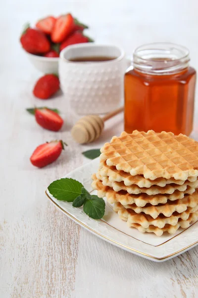 Delicious breakfast with croissants, waffles and fresh strawberr — Stock Photo, Image