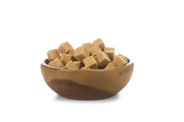 Cukier trzcinowy w drewnianej misce — Zdjęcie stockowe