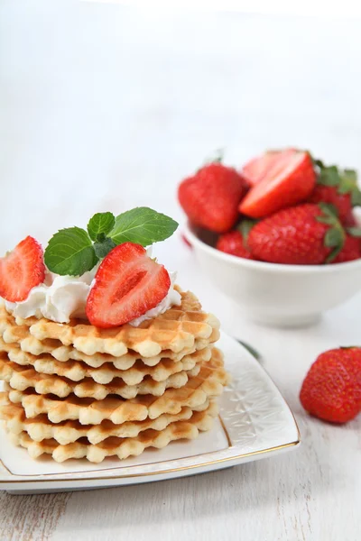 Delicious waffles with strawberries and mint — Stock Photo, Image