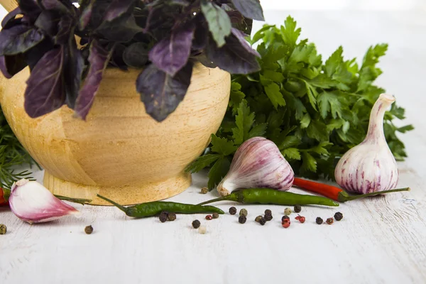 Basil on a  wooden background — Stock Photo, Image