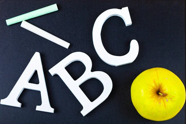 Letters ABC and chalk board. Back to school. Stationery.