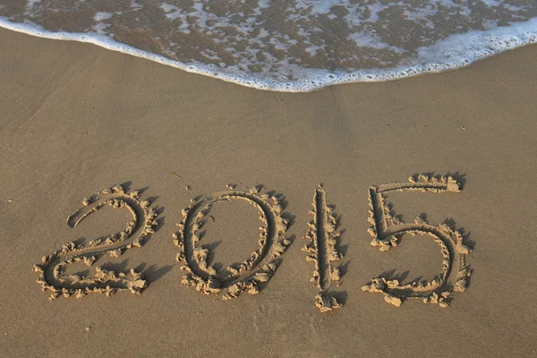 Rok 2015 numer napisany na plaży — Zdjęcie stockowe