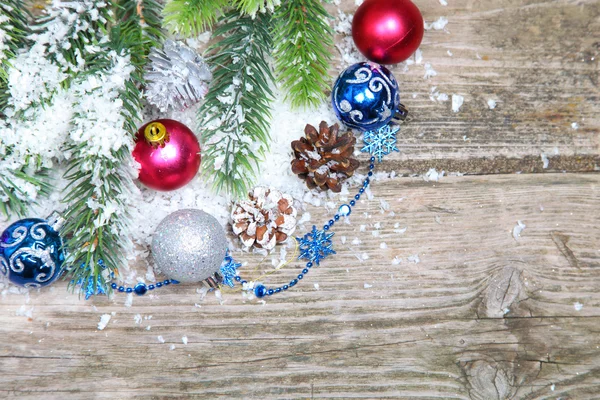 Christmas decorations in the snow — Stock Photo, Image