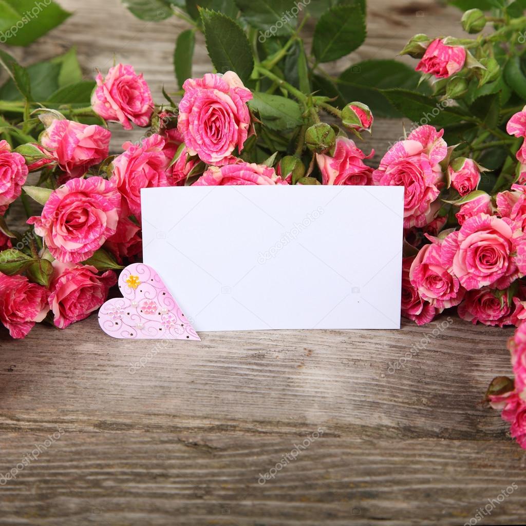 Bouquet of pink roses, heart  and greeting card