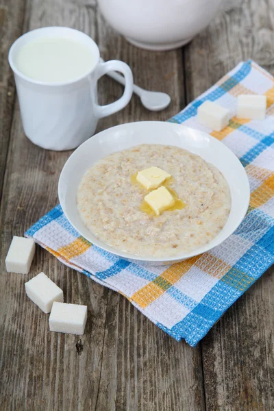 Oatmeal with butter — Stock Photo, Image