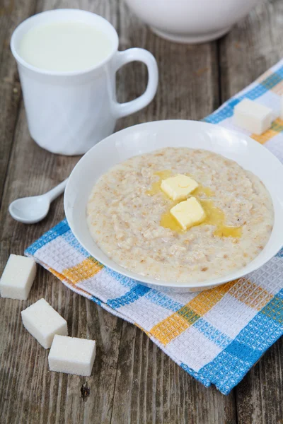 Oatmeal with butter — Stock Photo, Image