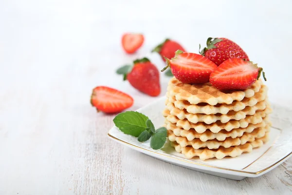 Waffles and ripe strawberries. — Stock Photo, Image