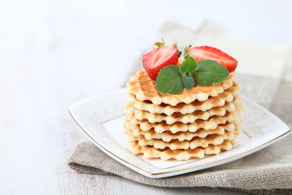 Waffles, mint and ripe strawberries — Stock Photo, Image
