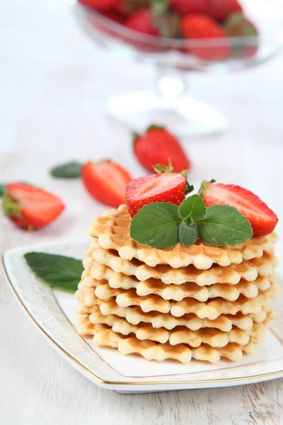 Waffles, mint and ripe strawberries. — Stock Photo, Image