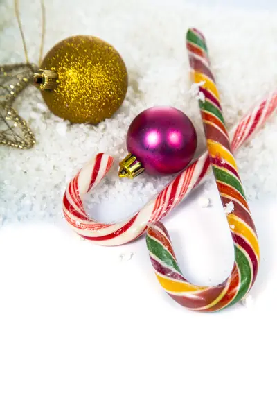 Christmas decorations in the snow — Stock Photo, Image