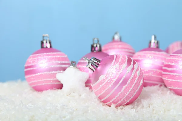 Christmas balls on the snow — Stock Photo, Image