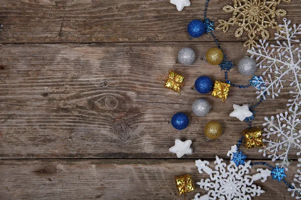 Christmas decorations on an old wooden table — Stock Photo, Image