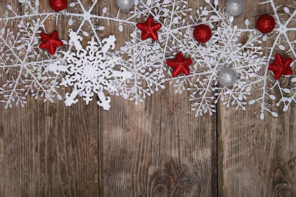 Border of snowflakes and Christmas decoration — Stock Photo, Image