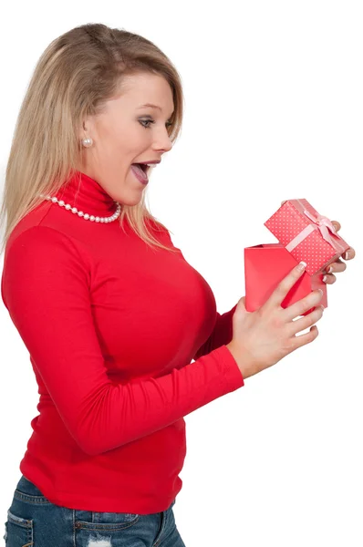 Beautiful woman opening a present — Stock Photo, Image