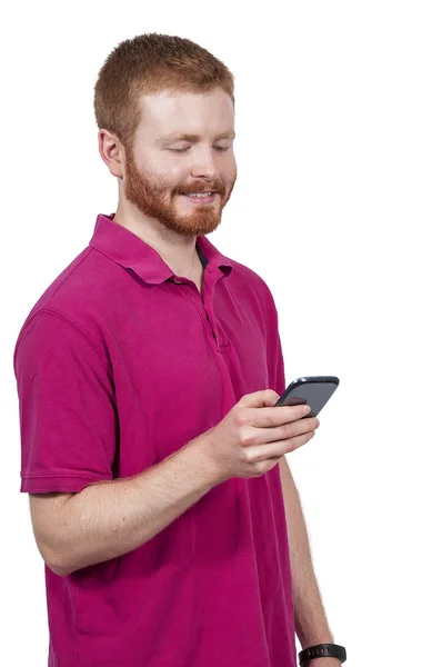 Junger Mann schreibt SMS — Stockfoto