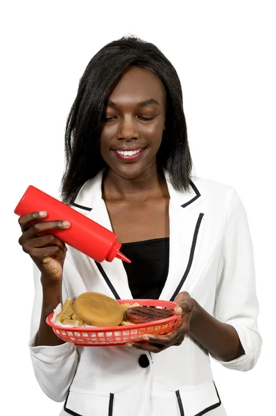 Woman with hamburger Stock Picture
