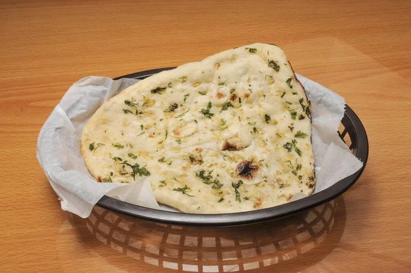 Delicious Afghan or Indian dish known as garlic naan