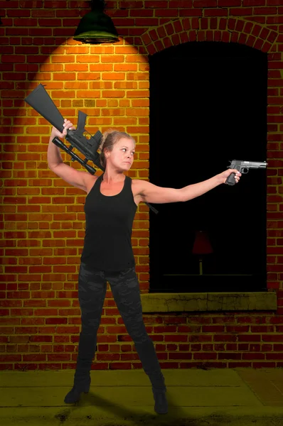 Woman with Assault Rifle and Handgun