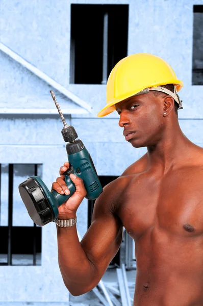 Bauarbeiter mit Bohrer — Stockfoto