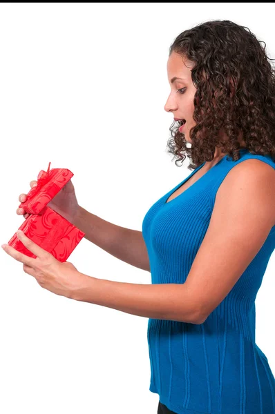Beautiful woman opening a present — Stock Photo, Image