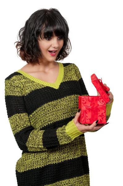 Beautiful woman opening a present — Stock Photo, Image