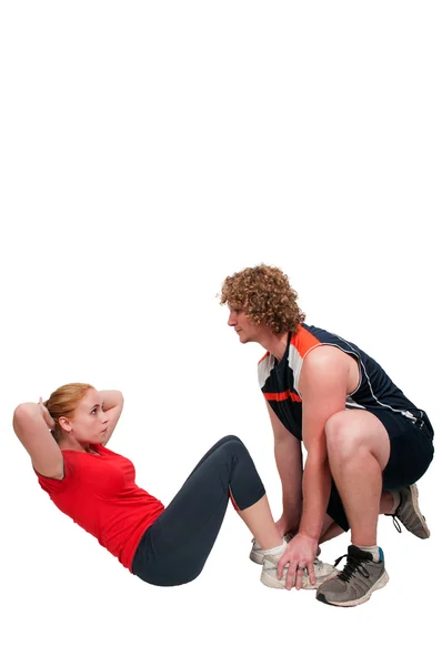 Coppia facendo sit up — Foto Stock