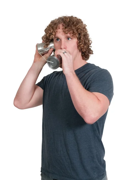 Człowiek za pomocą blaszany telefon — Zdjęcie stockowe