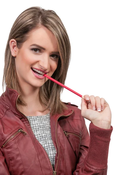 Vrouw kauwen potlood — Stockfoto