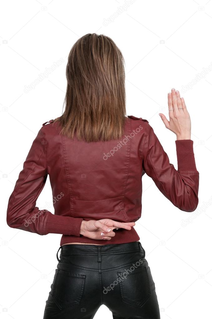 Woman with fingers crossed