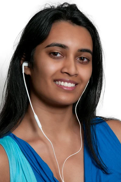 Woman with ear buds — Stock Photo, Image