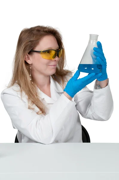 Woman Scientist with glass beaker — Stock Photo, Image