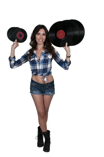 Femme avec disques vinyle — Photo