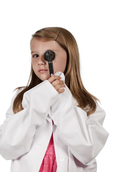 Child doctor with an otoscope — Stock Photo, Image