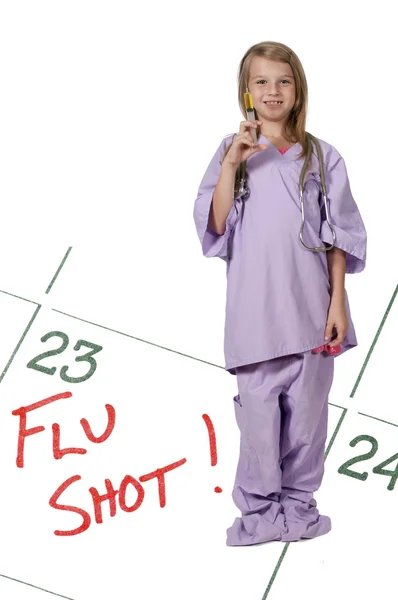 Médico menina com seringa — Fotografia de Stock