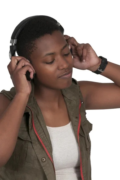 Piękna kobieta słuchania słuchawki — Zdjęcie stockowe