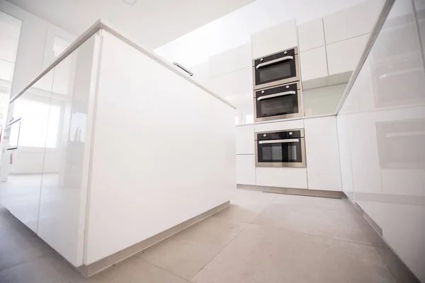 New modern kitchen white color and three oven — Stock Photo, Image