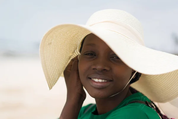 Beautiful African American girl on sea beach sand Royalty Free Stock Images