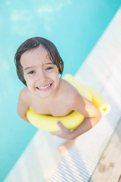 Young boy kid child splashing in swimming pool having fun leisure activity — Stock Photo, Image