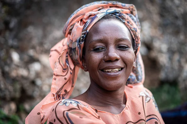 Black African senior beautiful woman with scarf outdoors portrait Royaltyfria Stockbilder