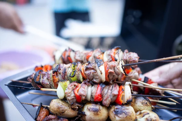 Preparing delicious barbecue with different meat and vegetables — Stock Photo, Image