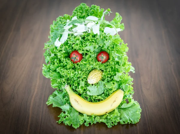 Face made of parts of healthy food — Stock Photo, Image