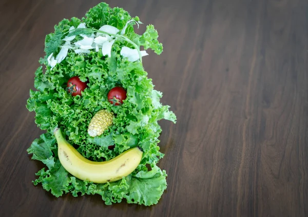 Face made of parts of healthy food — Stock Photo, Image